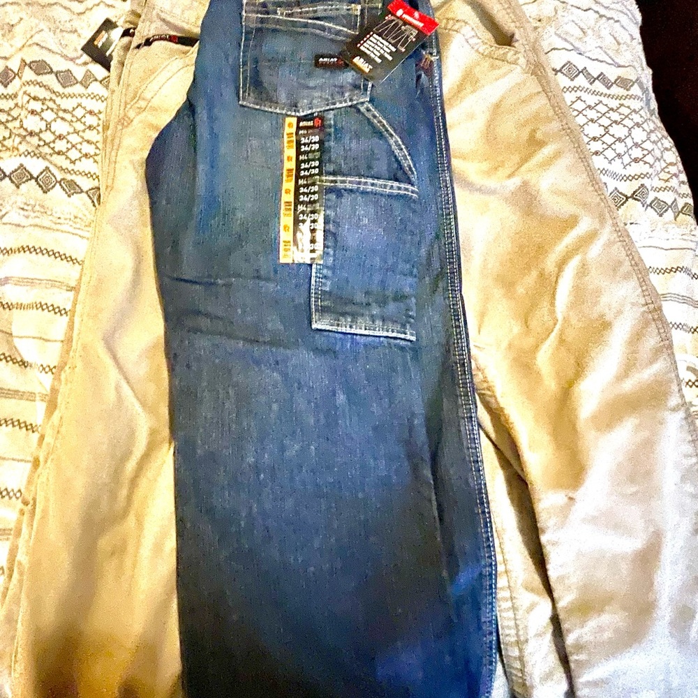 Ariat and Carhartt FR work pants . 34X30 70 both pair.
